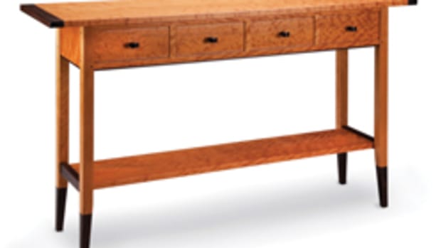 Dumke’s portfolio includes this solid cherry two-drawer table with wenge accents.