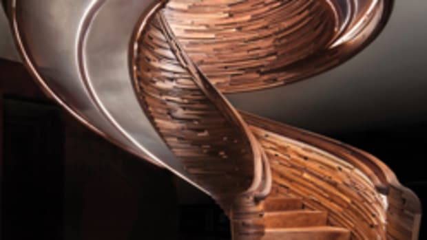 The best modern curved stairway, crafted by NK Woodworking & Design.