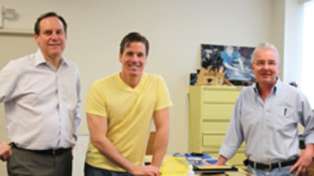 Tommy MacDonald visits DMT in Marlborough, Mass. (L-R: Mark Brandon, president of DMT; Tommy MacDonald, show host; and Stan Watson, DMT technical director).