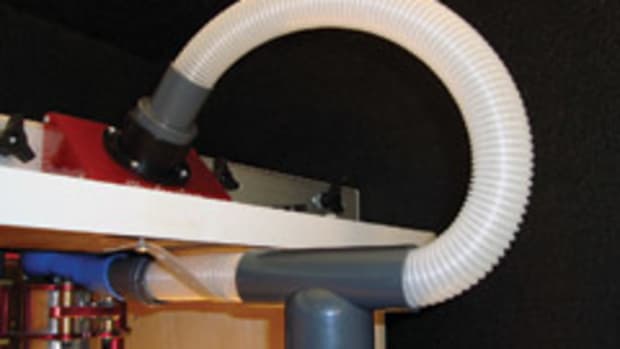 The Dust Router from Keen Products collects dust from the top and bottom of a router table.