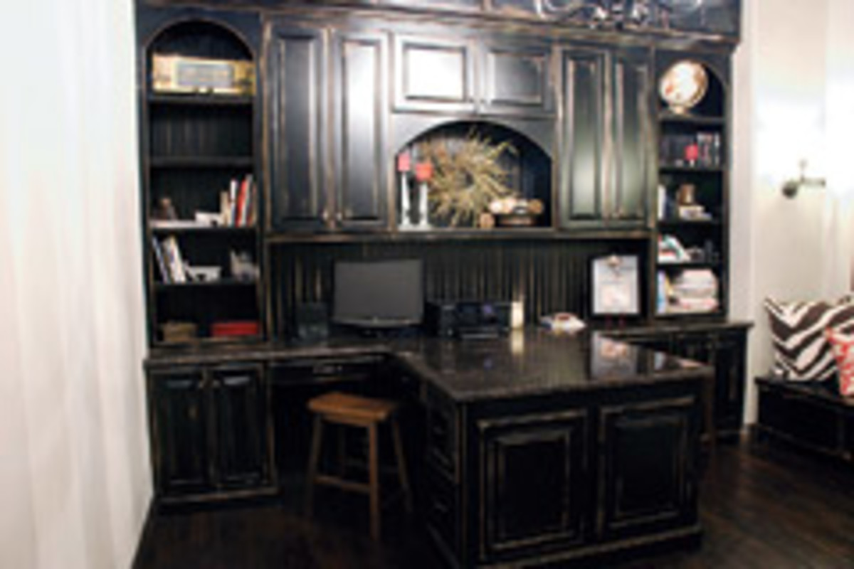 The shop's portfolio includes this home office with an in-house antiqued glaze finish.