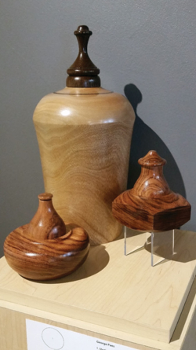 Turnings by George Paes and marquetry by Ken Frye (left) at the Wilding exhibit.