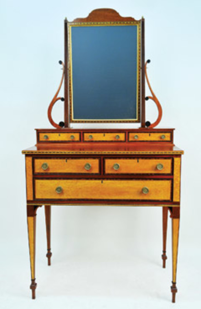 The Society of American Period Furniture Makers exhibit features this Federal dressing table by James Hardwick.