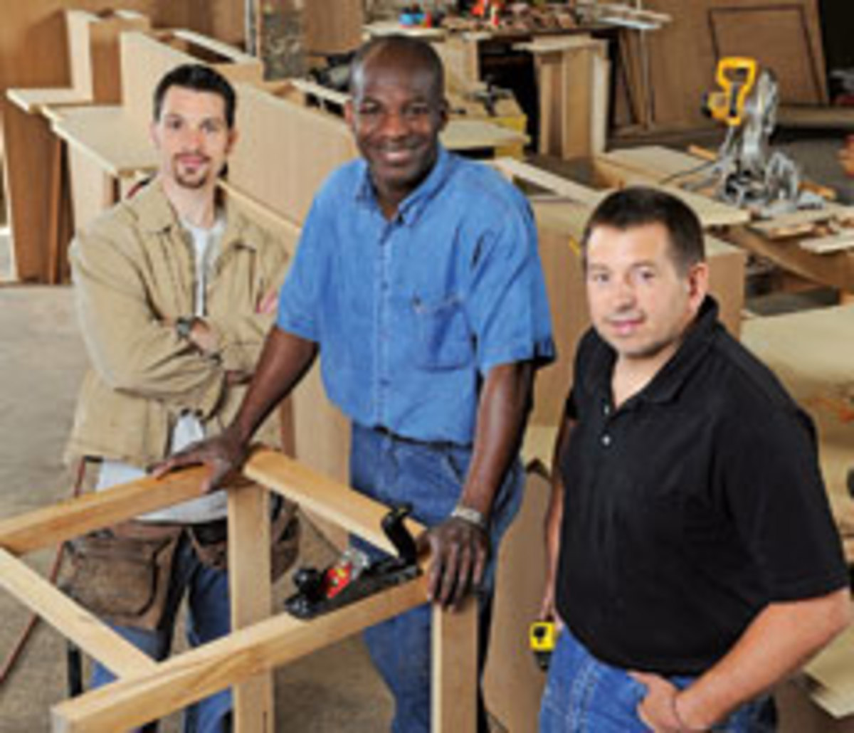 For Thomas Johnson, center, the dream of opening a woodworking school has been realized.