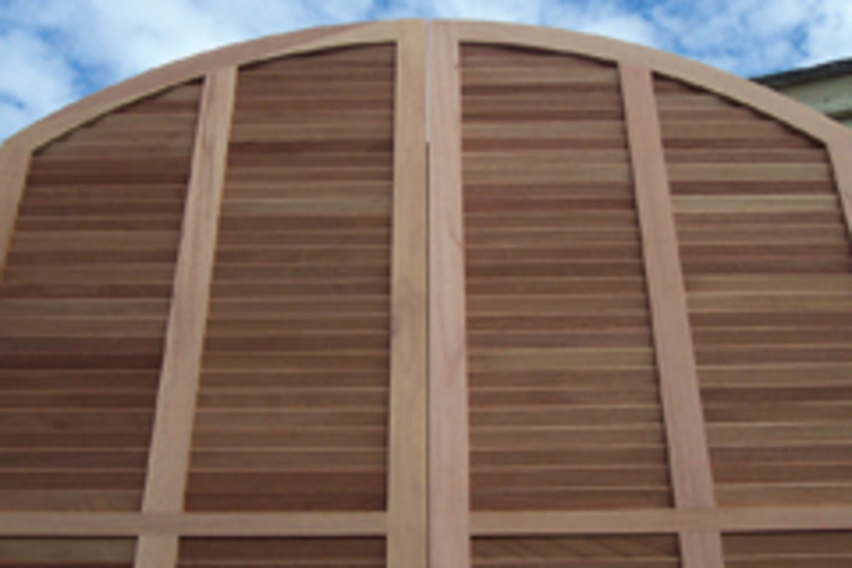 An arched shutter produced by Beech River Mill.