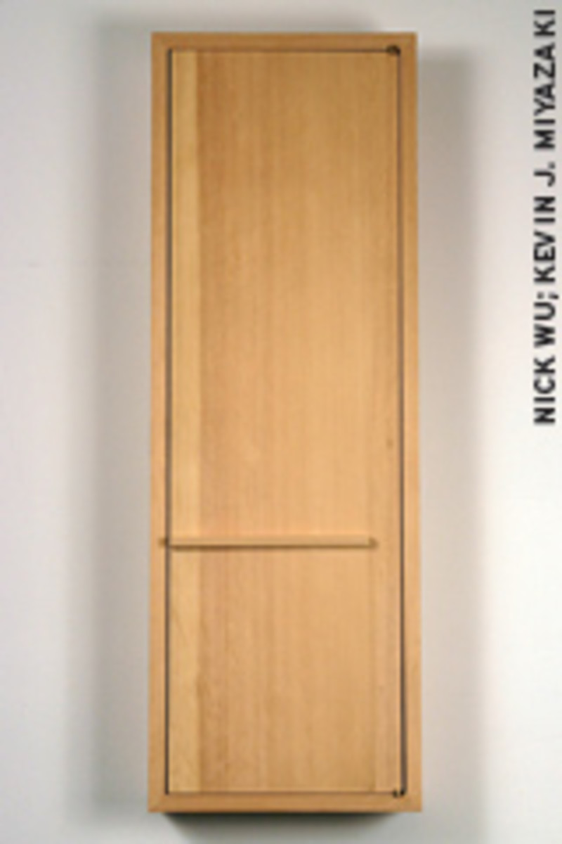 Maruyama's cabinet "ID," is made of pine and features replicas of the paper tags that internees wore during World War II.