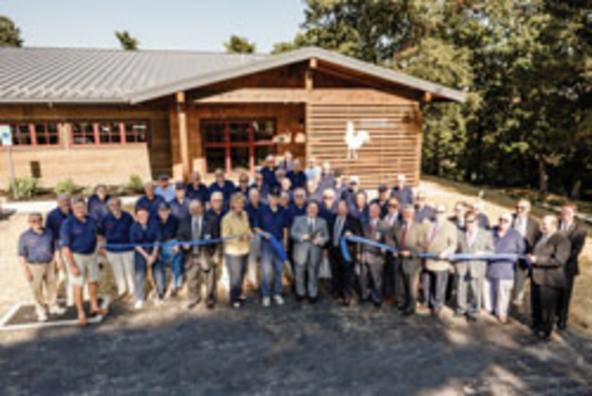 The ribbon-cutting ceremony at the Rooster’s Corner Woodworking Shop.