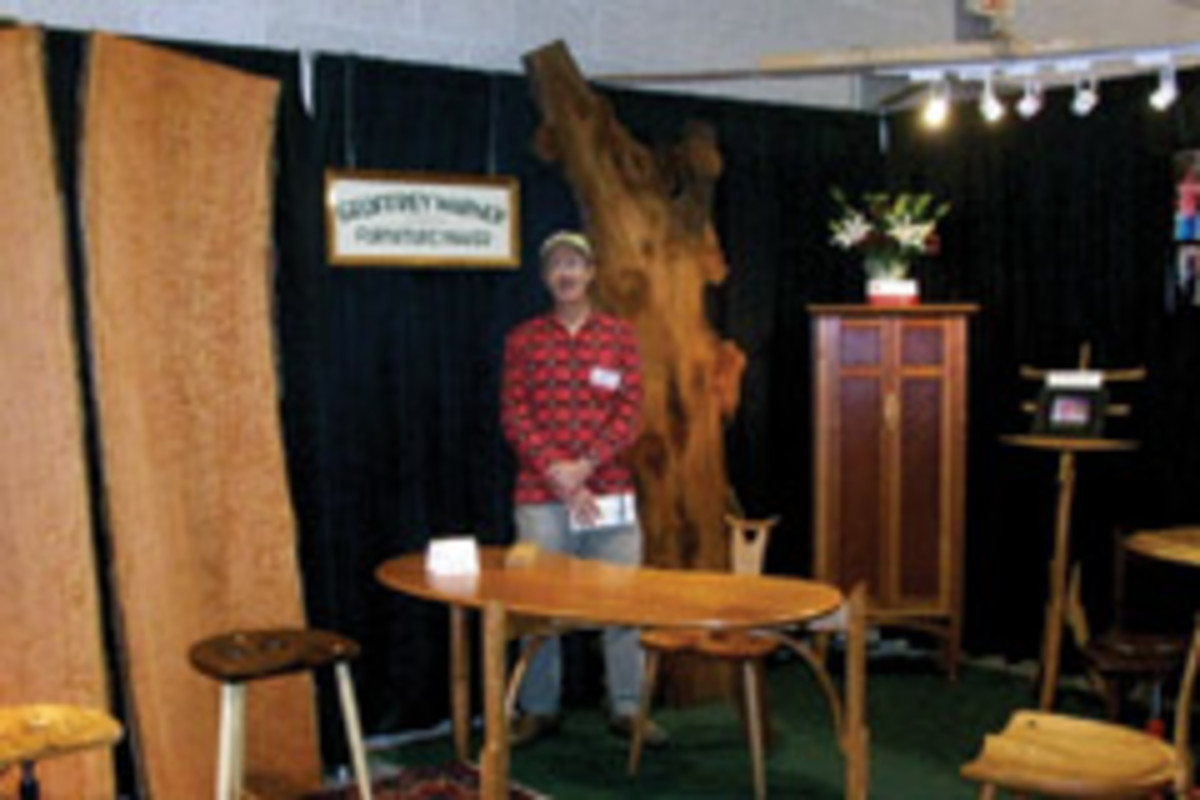 Exhbitor Geoffrey Warner at his booth at the Fine Furnishings & Fine Crafts Show in Providence, R.I.