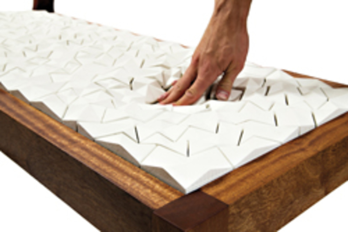 Annie Evelyn’s “Floe,” in collaboration with Ian Henderson, made with sapele, foam and cement. Cast cement tiles were “upholstered” to the sapele frame using a traditional button tufting technique.