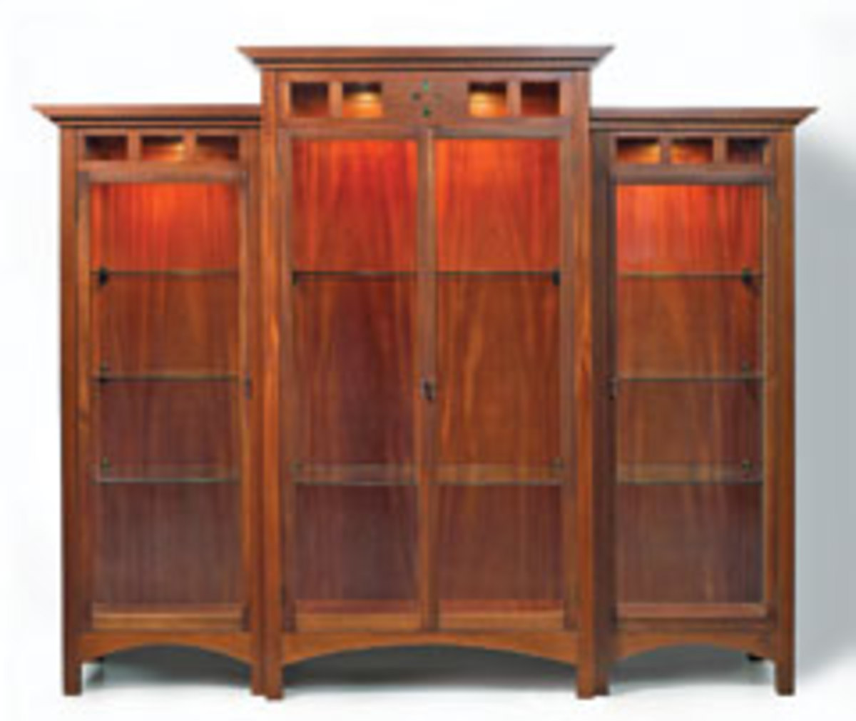 The partners have produced "The Three Sisters," which features mahogany and glass display cabinets inlaid with precious stones that also act as the switch for interior lights.