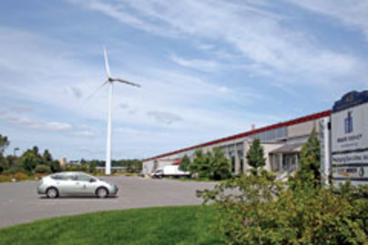 The wind turbine at Mark Richey Woodworking supplies about 80 percent of the shop's electricity.