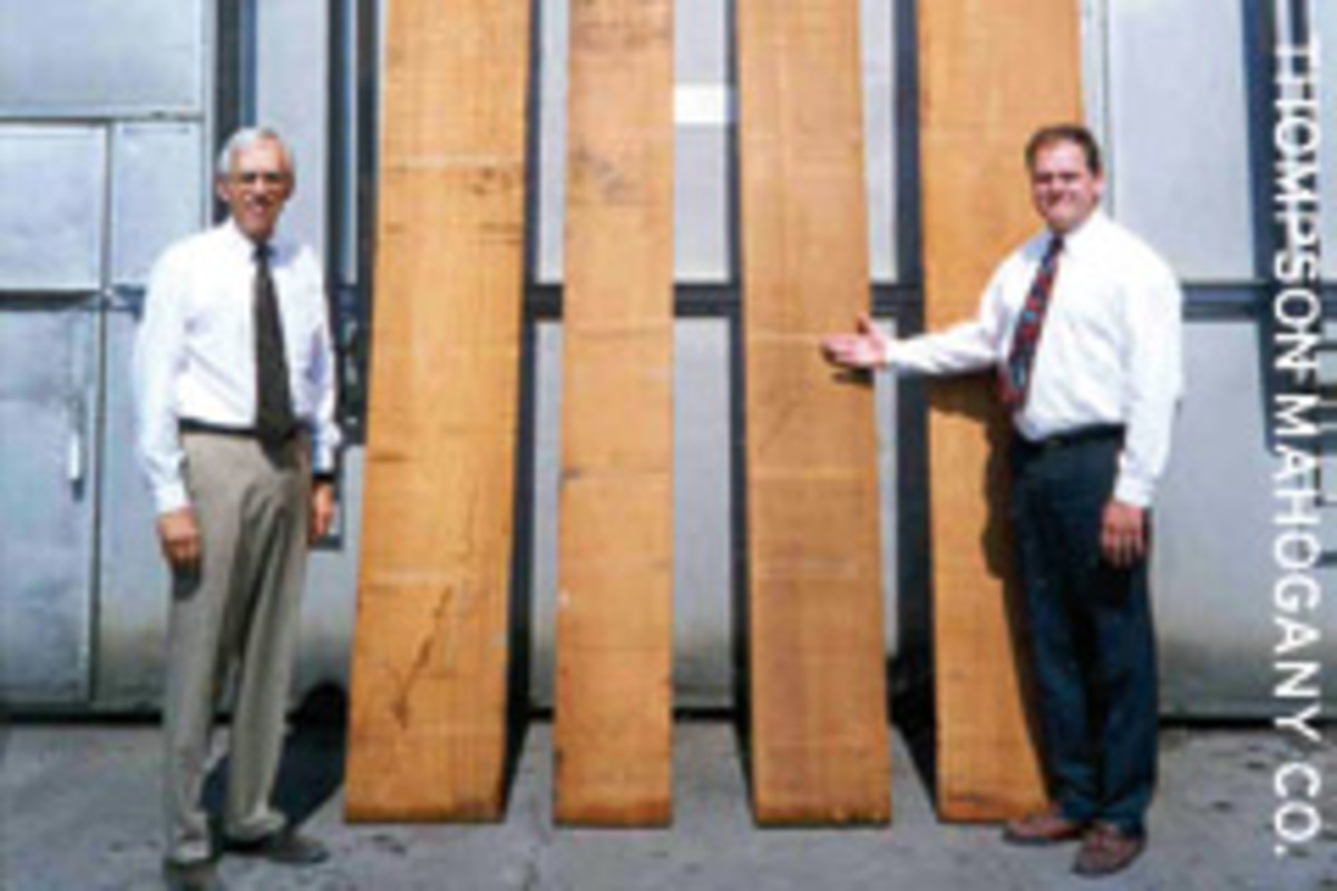 Don Thompson, left, and Ron Nienaber of Thompson Mahogany in Philadelphia display some large boards of African mahogany (Khaya spp.).
