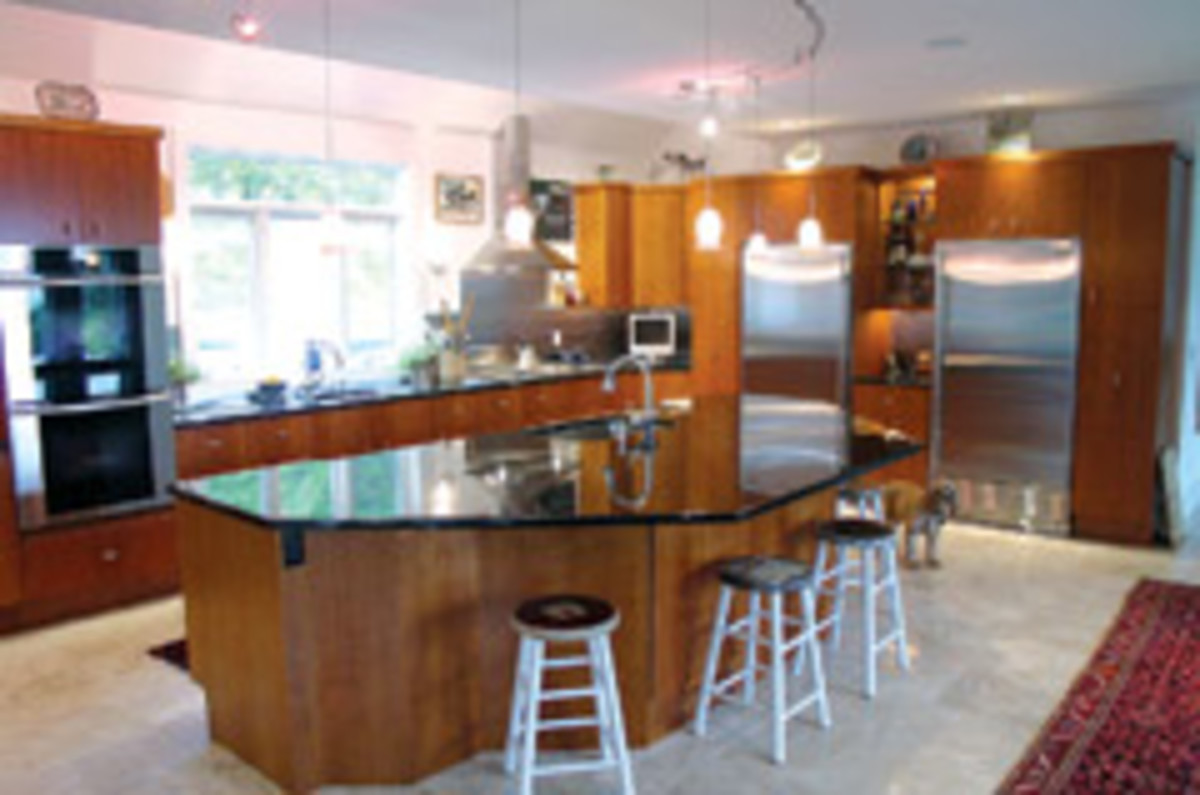 Bookmatched cherry veneert highlights this contemporary kitchen.