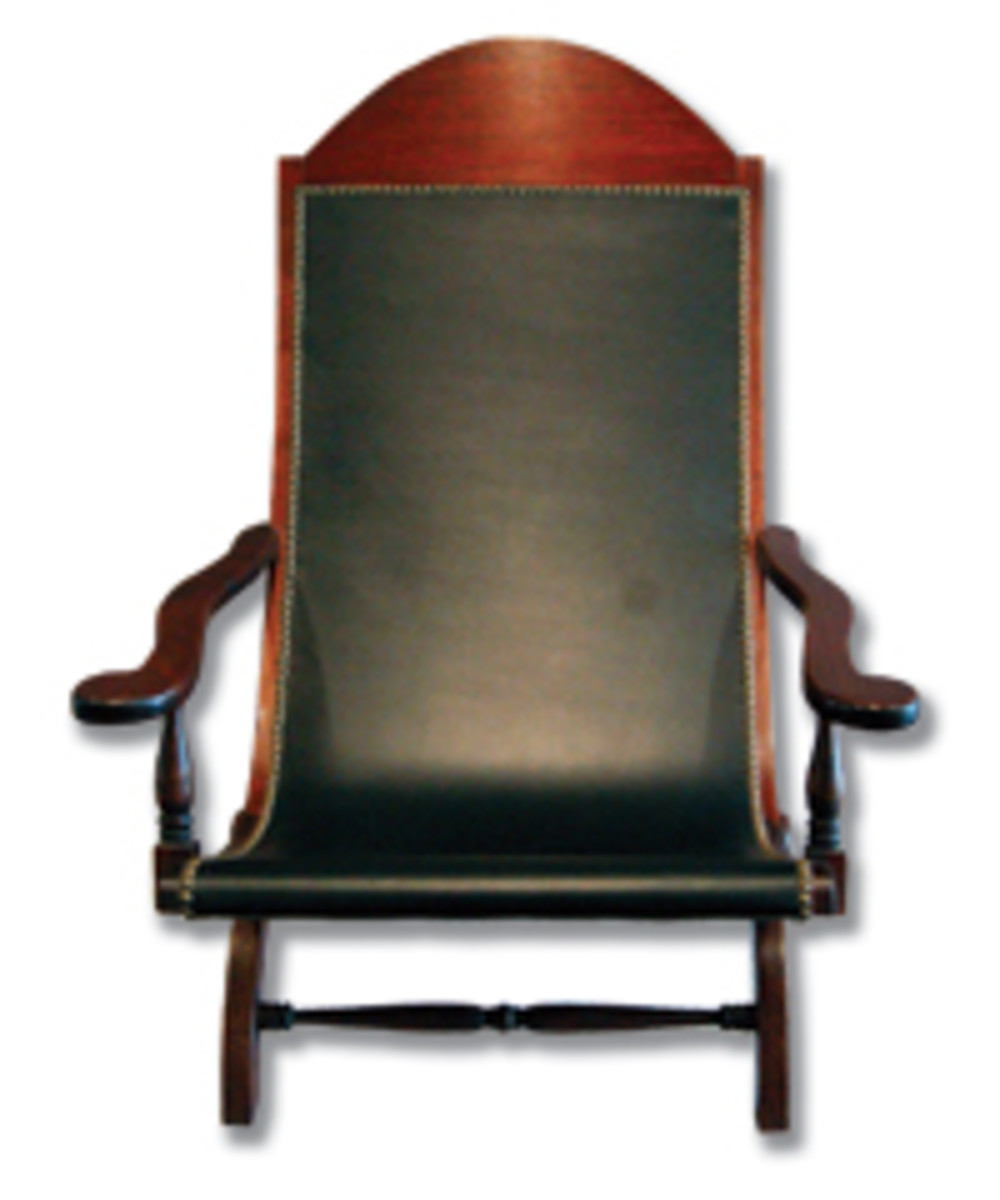 Arceneaux's mahogany-and-leather Bautac chair is based on a period chair from Patout Cottage in New Orleans.
