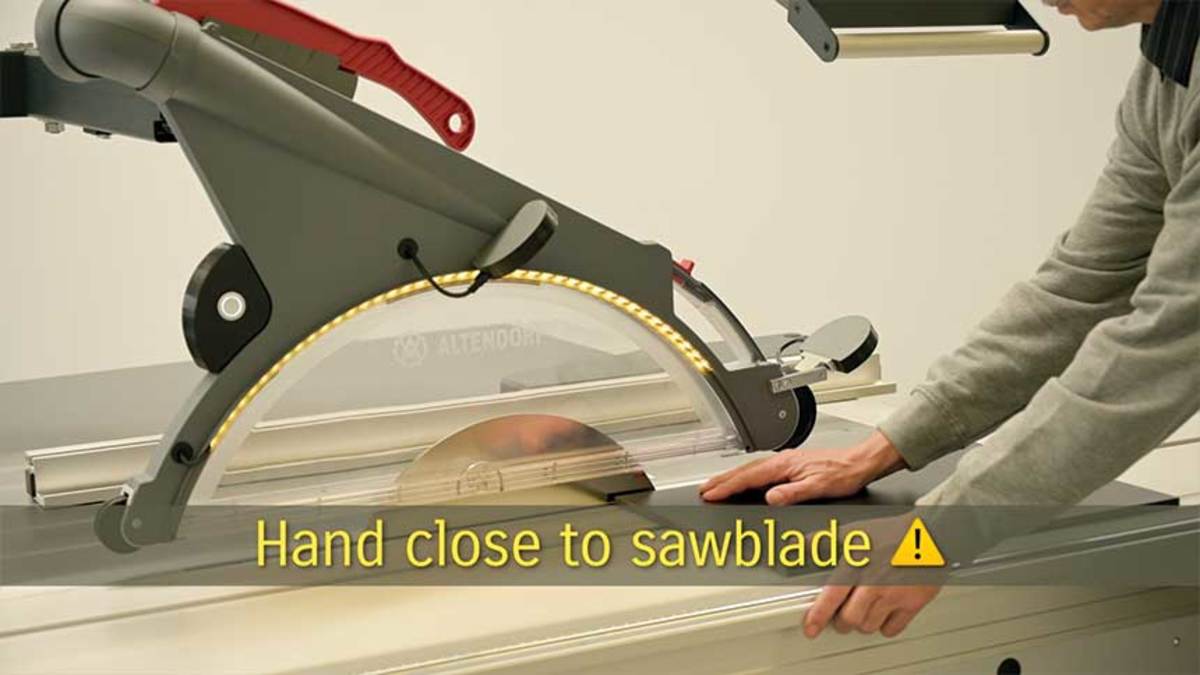 Cameras monitor hand position in relation to the blade with Altendorf’s Hand Guard system. If a hand gets close, the blade slows and warning lights display. If it gets real close, the blade drops below the table.  