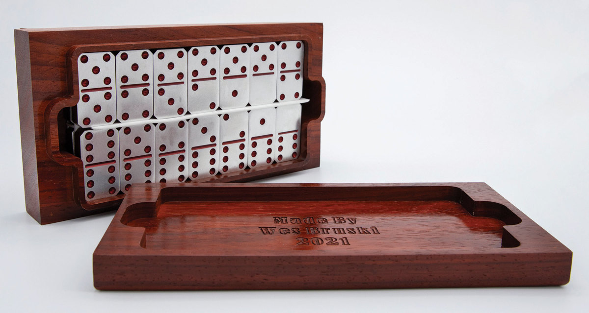 A domino and dice game cup set by Wes Bruski.
