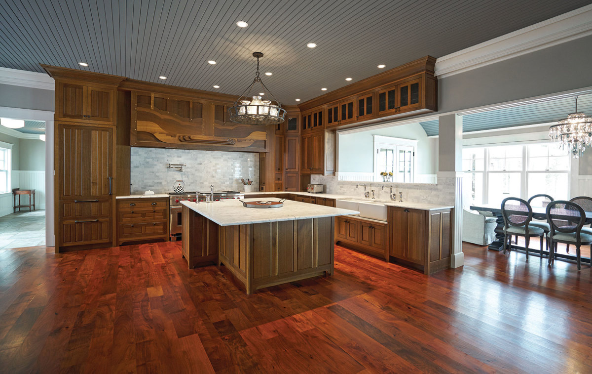 A kitchen by Chicone Cabinetmakers featuring fumed white oak cabinets.