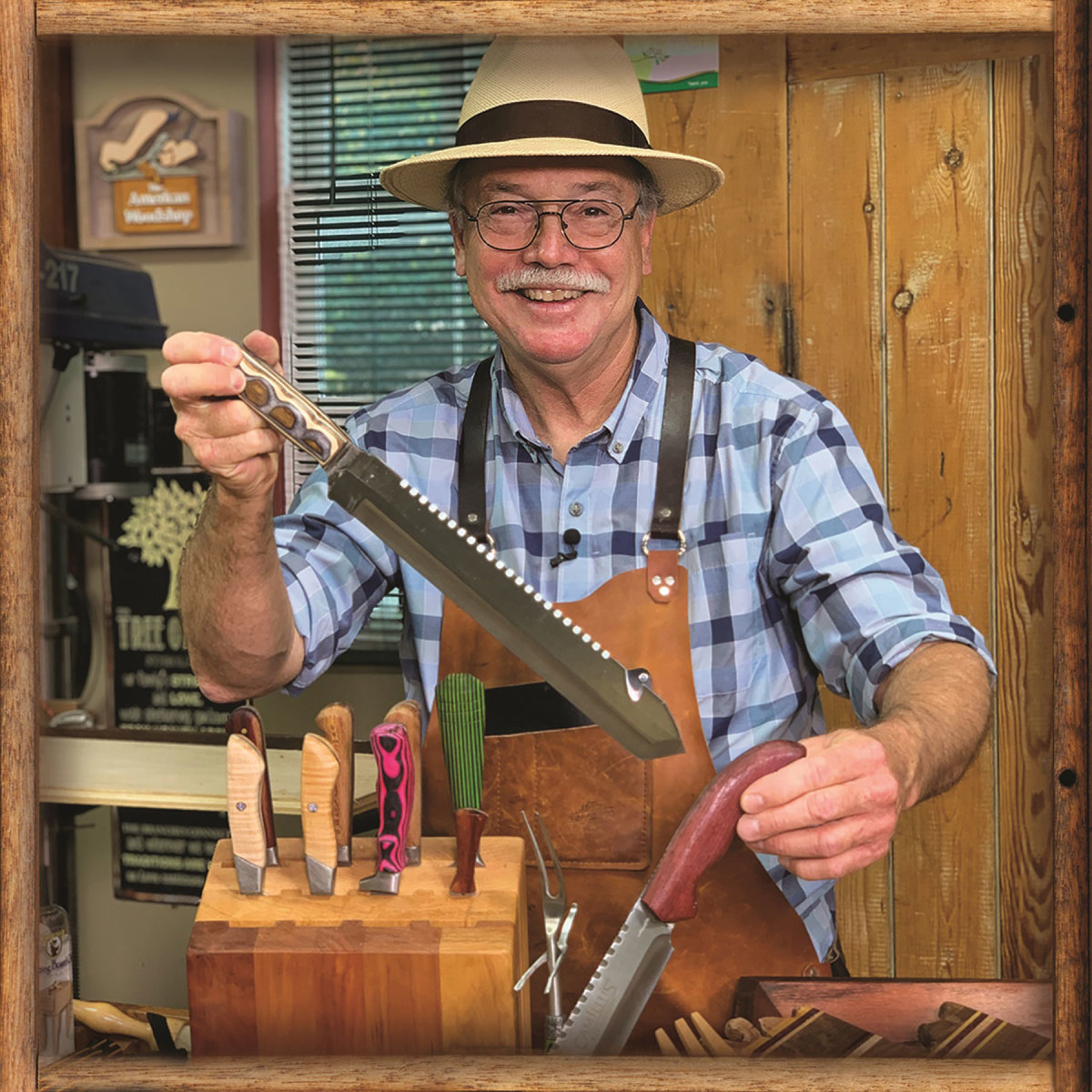 Scott Phillips with a set knives, featuring custom wood handles, made for this season 
of American Woodshop.