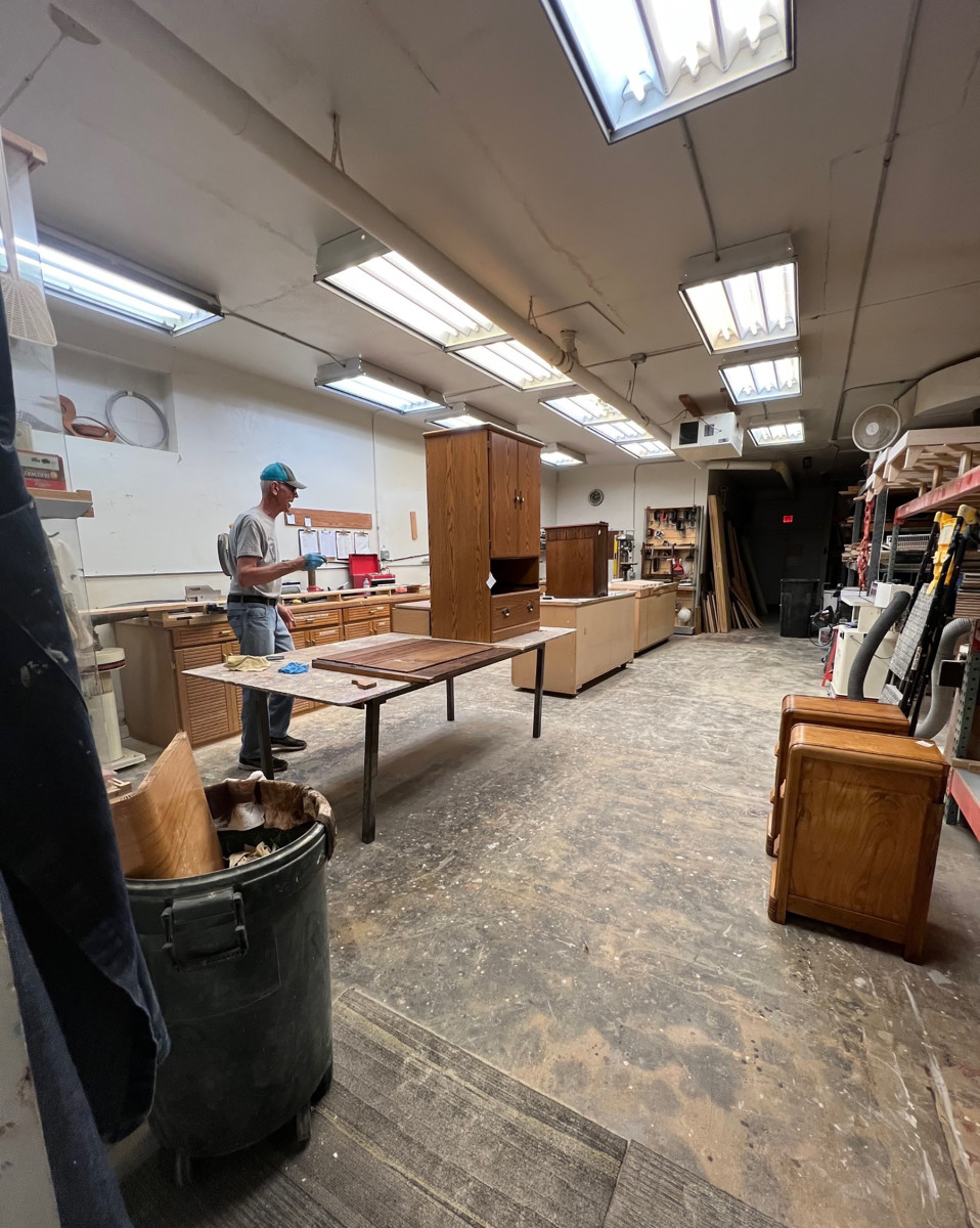 Volunteer John Bulsma in the old 300-sq.-ft. woodshop. The new shop, still in the design phase, will be three or four times larger.