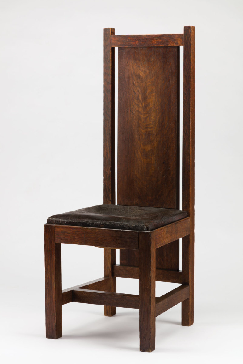 Wright’s FLW Heath House Chair Dining Chair (1904–1905, oak and leather upholostery) for the William R. Heath House in Buffalo, N.Y.