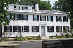 beech-river-mill-produced-these-raised-panel-shutters-with-a-decorative-cutout-and-for-this-home-in-manchester-by-the-sea-mass.jpg