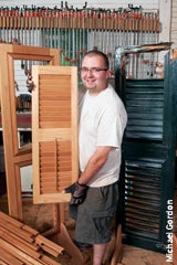 randy-oullette-holds-a-new-shutter-that-will-replace-the-one-on-the-right.jpg