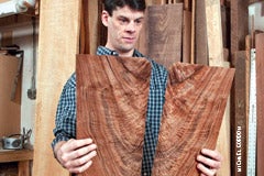 mack-examines-an-eastern-black-walnut-crotch-veneer-set.jpg