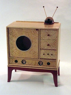 the-jukebox-liquor-cabinet-designed-to-look-like-a-tv-is-made-of-curly-red-oak-quilted-maple-paduak-purpleheart-and-silverleaf.jpg
