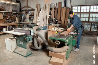 mack-runs-a-board-through-his-1940s-16-williamsport-jointer.jpg