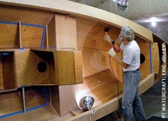 port-townsend-watercraft-owner-russell-brown-applies-epoxy-to-the-interior-of-the-skiff.jpg