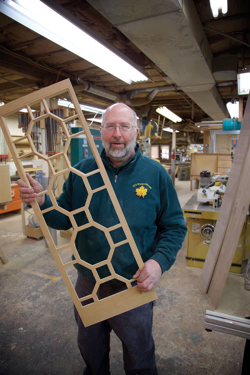 tom-scheve-holding-work.jpg