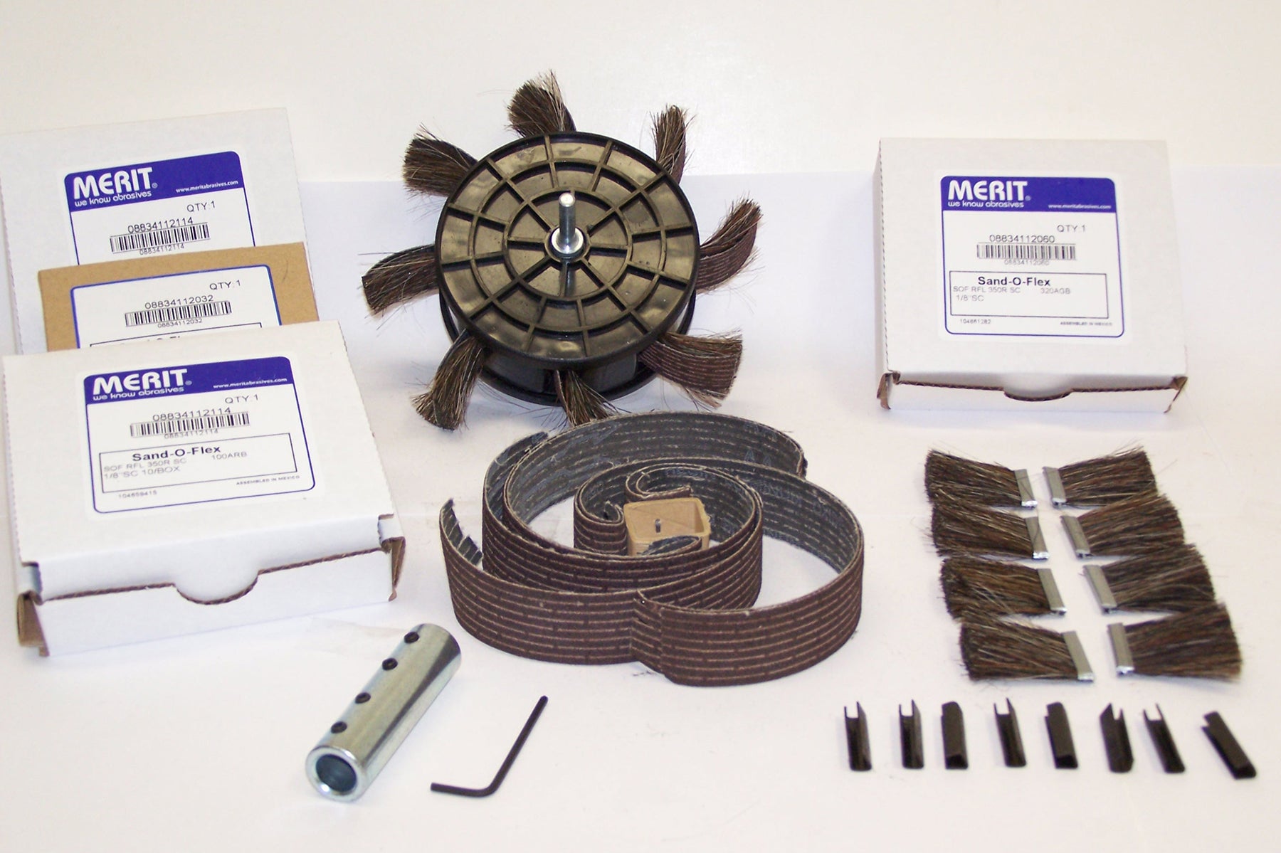 k-turning-a-knob-feeds-out-new-abrasive-strips-as-needed-on-the-sand-o-flex-flap-sander-from-supergrit-abrasives.jpg